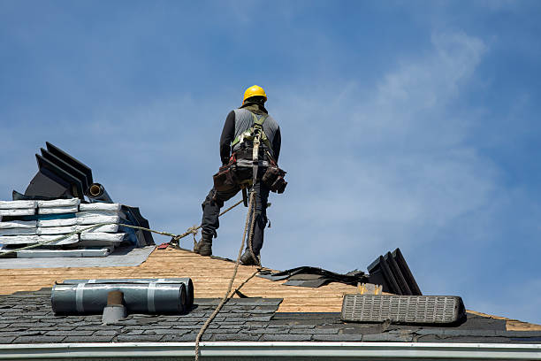 Professional Roofing technician working in Fitchburg, MA